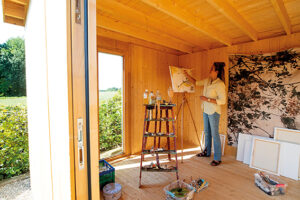 A garden room being used as an artist's studio.